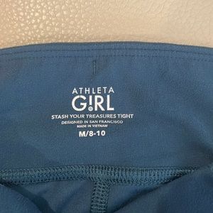 7 pairs of Athleta Girl Medium size 8-10 leggings.